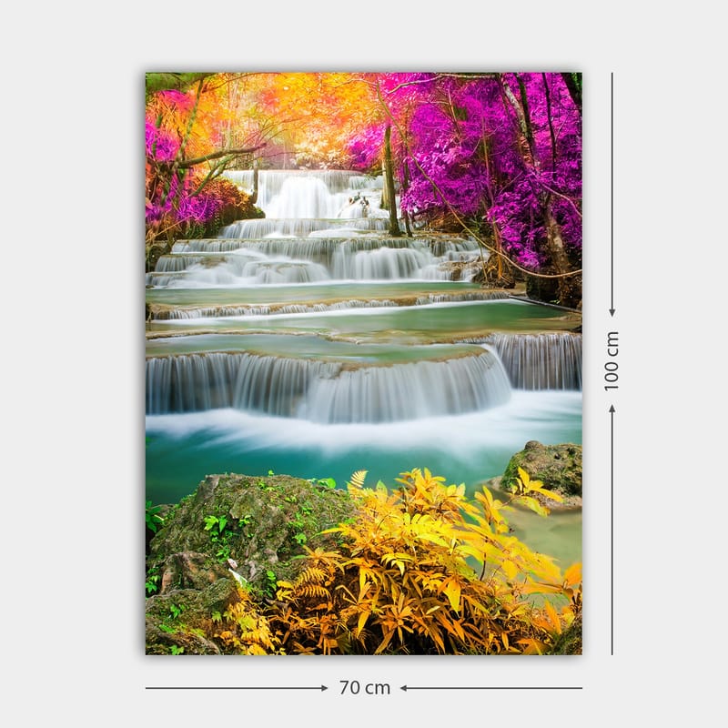 Lerretsbilde 70x100 cm - Vakker foss omgitt av fargerike trær og planter - Lilla / Grønn / Oransje - Interiør - Maleri & posters - Lerretsbilder