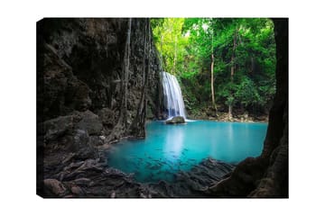 Lerretsbilde 70x100 cm - Vakker foss omgitt av frodig grøntområde og klart turkis vann - Turkis / Grønn / Grå - Interiør - Maleri & posters - Lerretsbilder