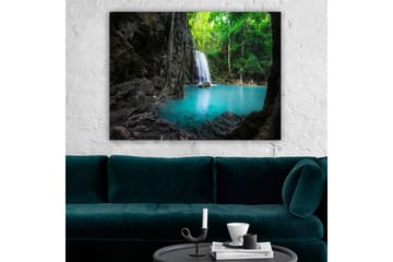 Lerretsbilde 70x100 cm - Vakker foss omgitt av frodig grøntområde og klart turkis vann - Turkis / Grønn / Grå - Interiør - Maleri & posters - Lerretsbilder