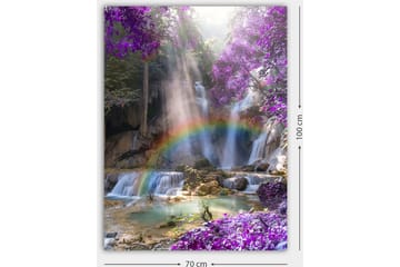 Lerretsbilde 70x100 cm - Vakker fossescene omgitt av lilla blomster og en regnbue - Lilla / Blå / Grønn - Interiør - Maleri & posters - Lerretsbilder