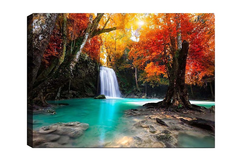 Lerretsbilde 70x100 cm - Vakker høstscene med en foss omgitt av fargerike trær i oransje og røde nyanser, Turkis / Oransje / Rød