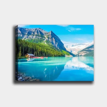 Lerretsbilde 70x100 cm - Vakker innsjø omgitt av majestetiske fjell og tett grøntområde - Turkis / Grønn / Blå - Interiør - Maleri & posters - Lerretsbilder