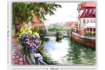 Lerretsbilde 70x100 cm - Vakker kanal med blomster i forgrunnen og pittoreske bygninger i bakgrunnen - Grønn / Blå / Lilla - Interiør - Maleri & posters - Lerretsbilder
