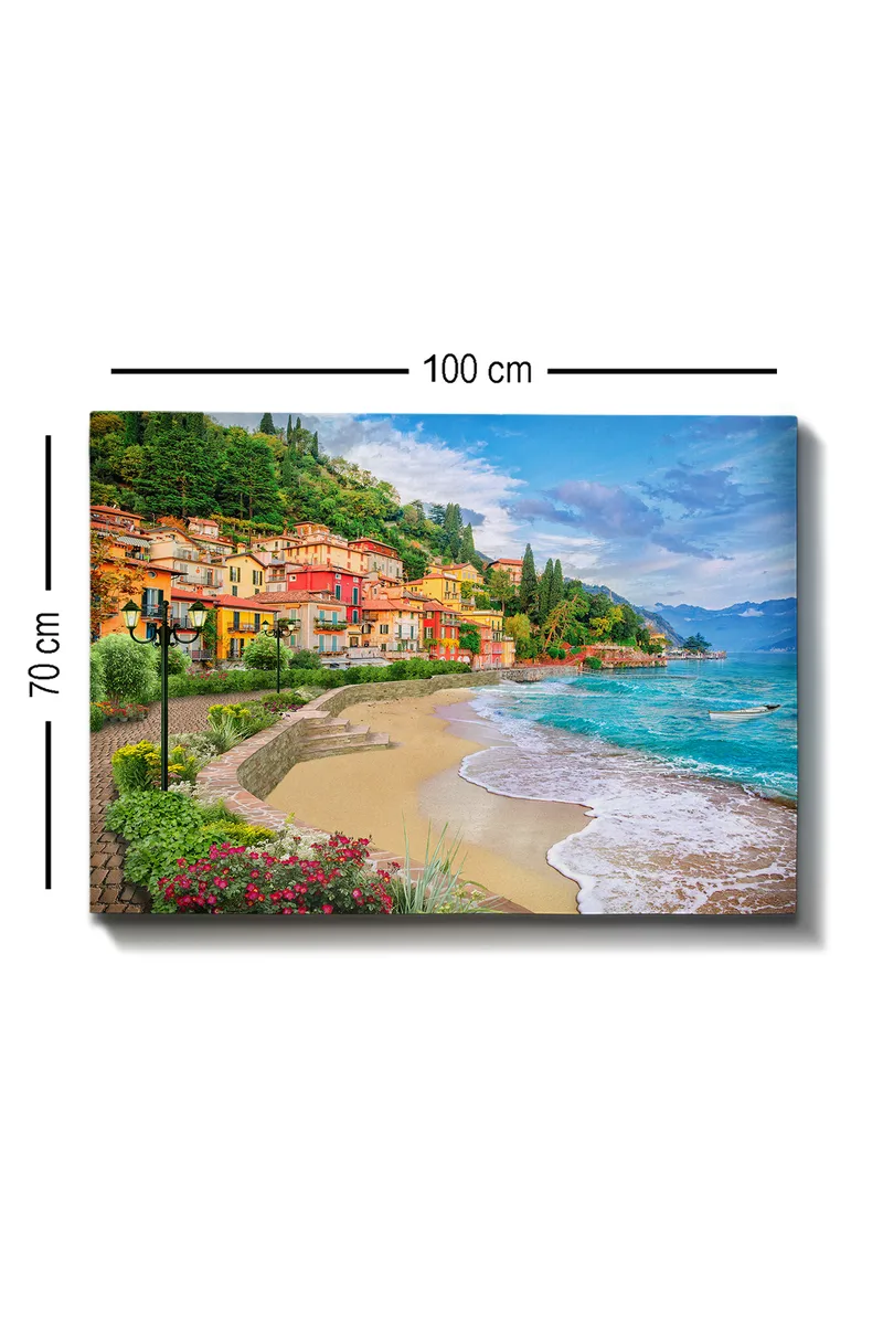 Lerretsbilde 70x100 cm - Vakker kystlinje med fargerike hus som klatrer opp en frodig ås ved en strand - Blå / Grønn / Gul - Interiør - Maleri & posters - Lerretsbilder