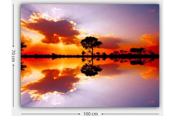 Lerretsbilde 70x100 cm - Vakker solnedgang med silhuetter av trær som speiler seg i en stille vannoverflate - Oransje / Lilla / Svart - Interiør - Maleri & posters - Lerretsbilder