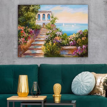 Lerretsbilde 70x100 cm - Vakker trapp omgitt av fargerike blomster som fører ned til havet og en bygning med blå vinduer - Grønn / Rosa / Blå - Interiør - Maleri & posters - Lerretsbilder
