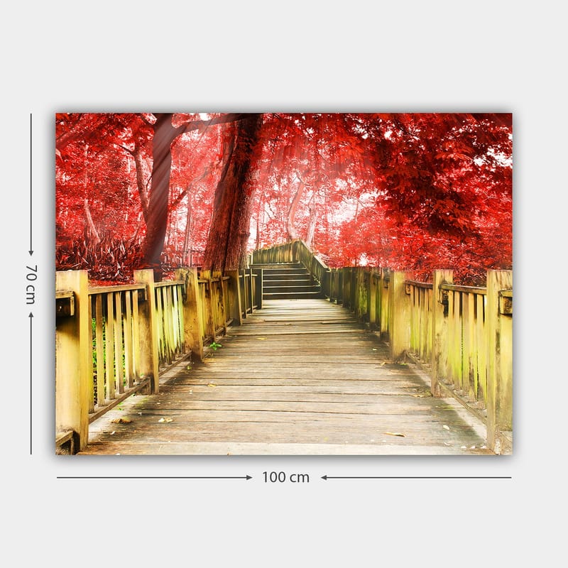 Lerretsbilde 70x100 cm - Vakker trebro omgitt av knallrøde trær i høstlige omgivelser - Rød / Gulgrønn - Interiør - Maleri & posters - Lerretsbilder