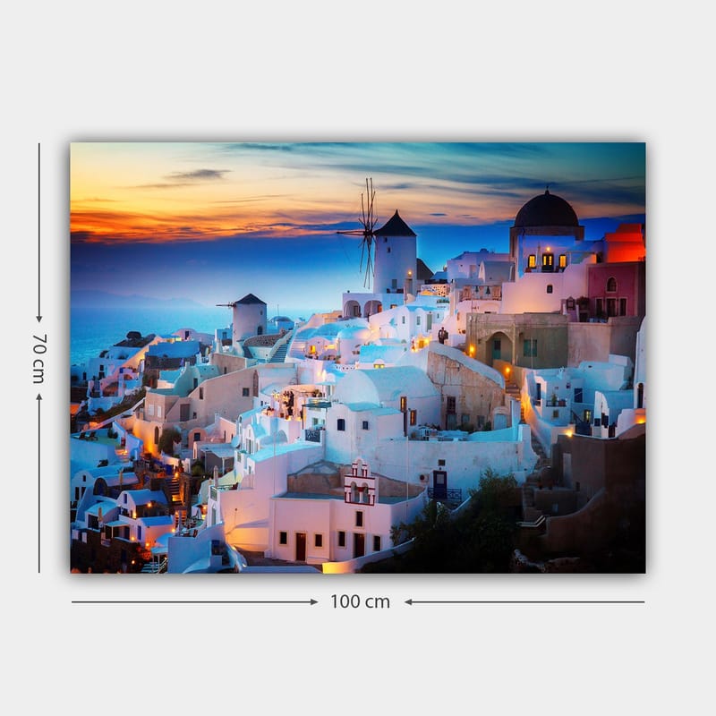 Lerretsbilde 70x100 cm - Vakker utsikt over de hvite husene i en gresk landsby ved solnedgang - Hvit / Blå / Oransje - Interiør - Maleri & posters - Lerretsbilder