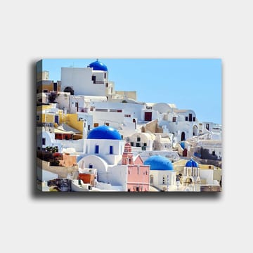 Lerretsbilde 70x100 cm - Vakker utsikt over de karakteristiske hvite husene og blå kuplene på Santorini - Blå / Hvit / Rosa - Interiør - Maleri & posters - Lerretsbilder