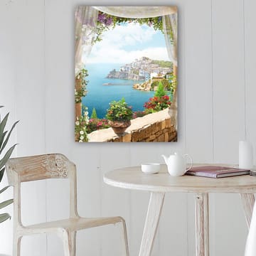 Lerretsbilde 70x100 cm - Vakker utsikt over en kystby med fargerike hus og blomstrende planter, sett gjennom en åpen vindusåpning - Blå / Grønn / Hvit - Interiør - Maleri & posters - Lerretsbilder