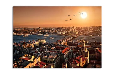 Lerretsbilde 70x100 cm - Vakker utsikt over Istanbul ved solnedgang, med hustak og båter på vannet - Oransje / Rød / Blå - Interiør - Maleri & posters - Lerretsbilder