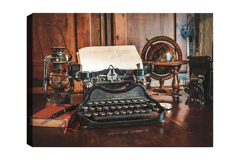 Lerretsbilde 70x100 cm - Vintage skrivemaskin med papir og en gammel globus på et trebord, Svart / Brun / Hvit