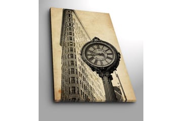 Lerretsbilde 70x100 cm - Vintageklokke ved foten av en ikonisk bygning i New York - Svart / Grå / Beige - Interiør - Maleri & posters - Lerretsbilder