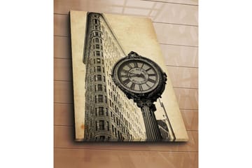 Lerretsbilde 70x100 cm - Vintageklokke ved foten av en ikonisk bygning i New York - Svart / Grå / Beige - Interiør - Maleri & posters - Lerretsbilder