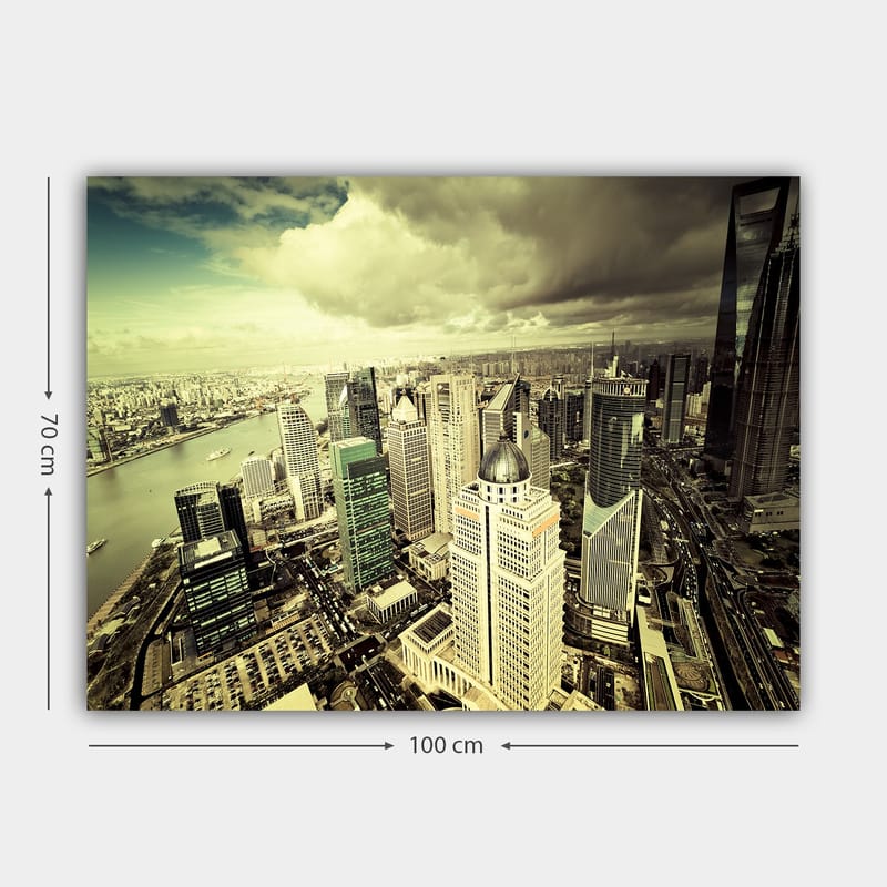 Lerretsbilde 70x100 cm - Panoramautsikt over en moderne by med høye skyskrapere og en elv som renner gjennom landskapet - Grønn / Grå / Beige - Interiør - Maleri & posters - Lerretsbilder