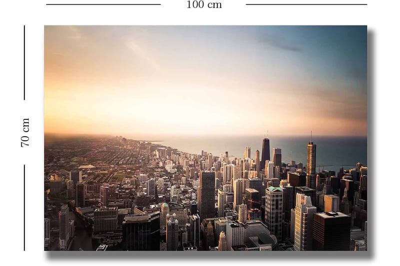 Lerretsbilde 70x100 cm - Panoramautsikt over en by med høye skyskrapere og en solnedgang som skaper en dramatisk atmosfære - Blå / Oransje / Grå - Interiør - Maleri & posters - Lerretsbilder