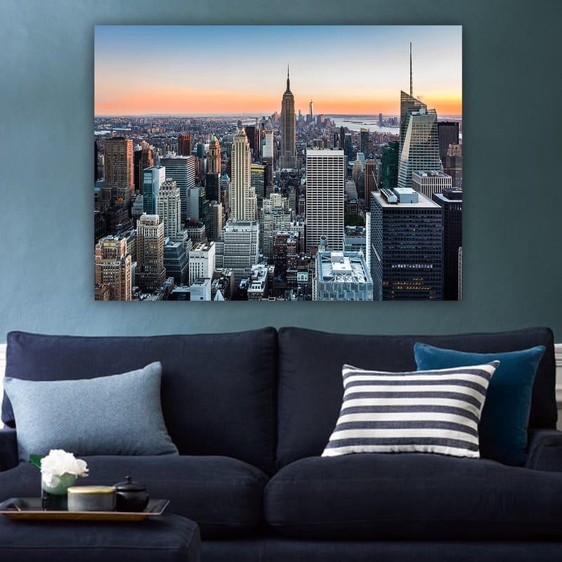 Lerretsbilde 70x100 cm - Panoramautsikt over New York City med ikoniske skyskrapere i solnedgangens lys - Blå / Grå / Oransje - Interiør - Maleri & posters - Lerretsbilder