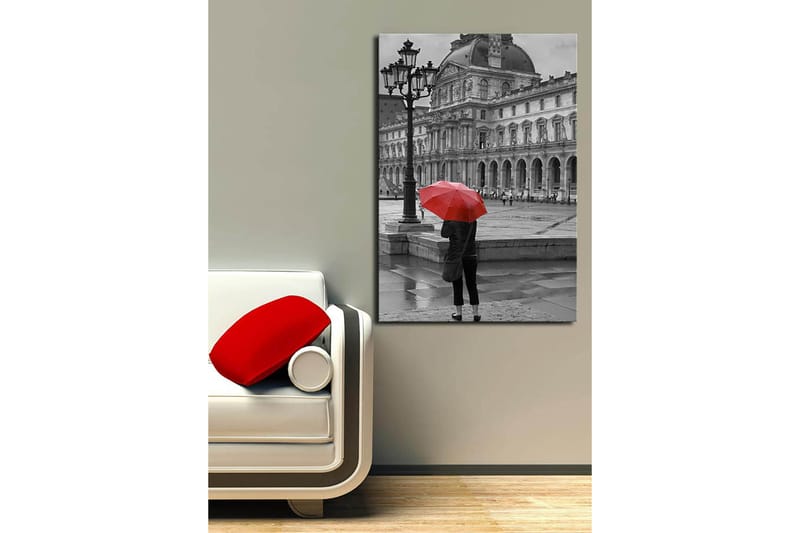 Lerretsbilde 70x100 cm - Person som står med en rød paraply i et regnfullt bymiljø foran en historisk bygning - Rød / Svart - Interiør - Maleri & posters - Lerretsbilder