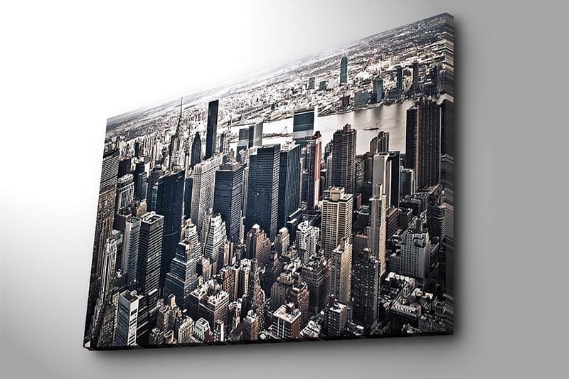 Lerretsbilde 70x100 cm - Panoramautsikt over en by med høye skyskrapere og et livlig bybilde - Svart / Grå / Hvit - Interiør - Maleri & posters - Lerretsbilder