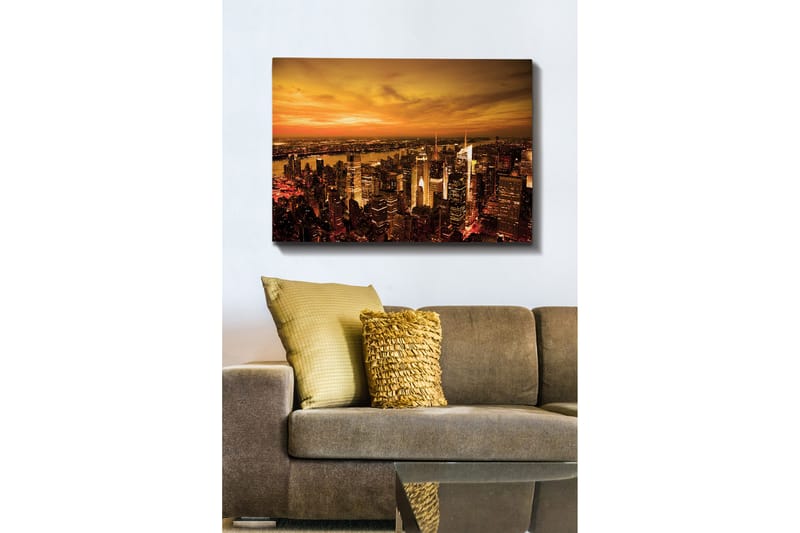 Lerretsbilde 70x100 cm - Panoramautsikt over en by ved solnedgang med høye bygninger og en dramatisk himmel, Oransje / Gull / Svart