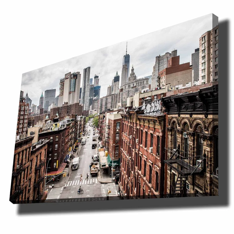 Lerretsbilde 70x100 cm - Panoramautsikt over en by med høye bygninger og travle gater - Mørk rød / Grå / Beige - Interiør - Maleri & posters - Lerretsbilder