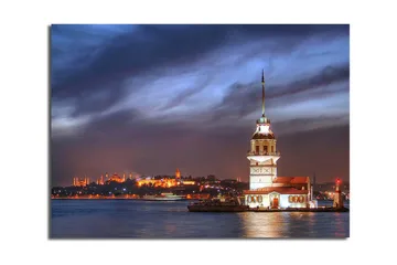 Lerretsbilde 70x45 cm - Vakkert fyrtårn plassert på vannet med en dramatisk himmel i bakgrunnen - Mørk blå / Hvit / Oransje - Interiør - Maleri & posters - Lerretsbilder