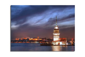 Lerretsbilde 70x45 cm - Vakkert fyrtårn plassert på vannet med en dramatisk himmel i bakgrunnen - Mørk blå / Hvit / Oransje - Interiør - Maleri & posters - Lerretsbilder