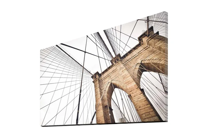 Lerretsbilde 70x45 cm - Perspektiv av Brooklyn Bridge med fokus på buene og kablene - Beige / Svart / Hvit - Interiør - Maleri & posters - Lerretsbilder