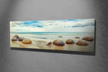 Lerretsbilde 80x30 cm - Runde steiner på en strand med hav og himmel i bakgrunnen - Blå / Beige / Grå - Interiør - Maleri & posters - Lerretsbilder