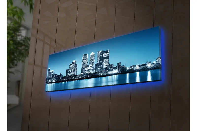 Lerretsbilde med LED-belysning 30x90 cm - Bysilhuett med moderne skyskrapere ved vannkanten - Blå / Svart / Hvit - Interiør - Maleri & posters - Lerretsbilder