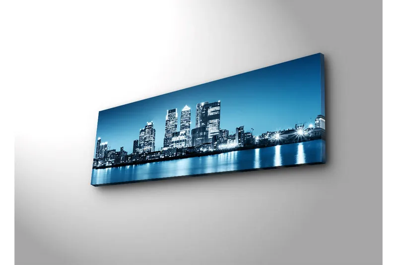 Lerretsbilde med LED-belysning 30x90 cm - Bysilhuett med moderne skyskrapere ved vannkanten - Blå / Svart / Hvit - Interiør - Maleri & posters - Lerretsbilder