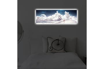 Lerretsbilde med LED-belysning 30x90 cm - Drømmeaktig landskap med en enslig figur som bærer en paraply i et snødekt miljø under en stjerneklar himmel - Blå / Hvit / Rosa - Interiør - Maleri & posters - Lerretsbilder