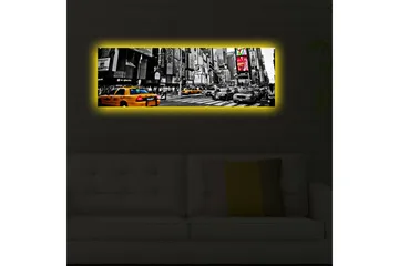 Lerretsbilde med LED-belysning 30x90 cm - Livlig bybilde med gule drosjer i et urbant miljø - Gul / Svart / Grå - Interiør - Maleri & posters - Lerretsbilder