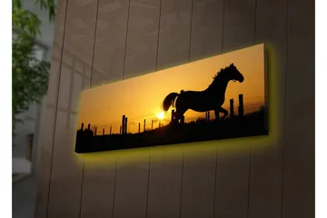 Lerretsbilde med LED-belysning 30x90 cm - Silhuett av en hest som galopperer ved solnedgang - Mørk brun / Oransje / Gul - Interiør - Maleri & posters - Lerretsbilder