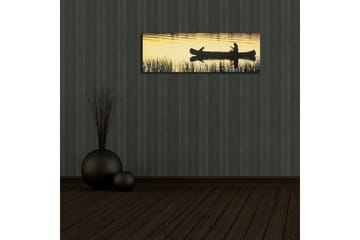 Lerretsbilde med LED-belysning 30x90 cm - Silhuett av en kano med en person og en hund i solnedgangens lys - Gull / Svart - Interiør - Maleri & posters - Lerretsbilder