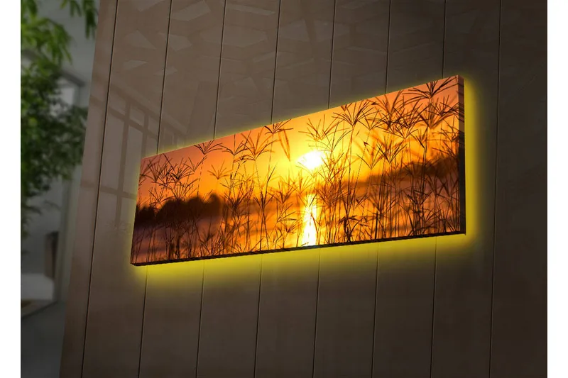 Lerretsbilde med LED-belysning 30x90 cm - Solnedgang over en speilblank innsjø med gress i forgrunnen - Oransje / Gull / Svart - Interiør - Maleri & posters - Lerretsbilder