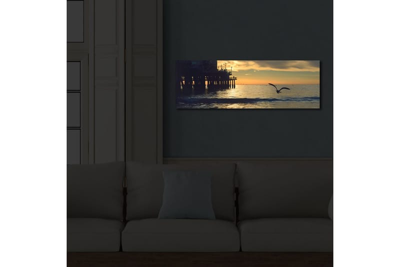 Lerretsbilde med LED-belysning 30x90 cm - Solnedgang over havet med en fugl i flukt - Oransje / Blå / Grå - Interiør - Maleri & posters - Lerretsbilder