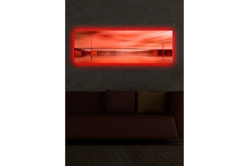 Lerretsbilde med LED-belysning 30x90 cm - Storslått utsikt over en bro over en speilblank vannflate i solnedgangens farger - Rød / Oransje / Svart - Interiør - Maleri & posters - Lerretsbilder