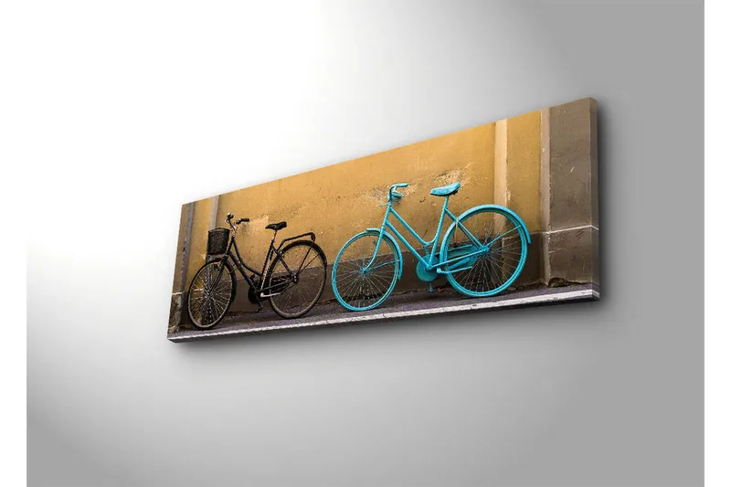 Lerretsbilde med LED-belysning 30x90 cm - Sykler i kontrastfarger mot en gul vegg - Svart / Turkis / Gul - Interiør - Maleri & posters - Lerretsbilder