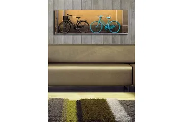 Lerretsbilde med LED-belysning 30x90 cm - Sykler i kontrastfarger mot en gul vegg - Svart / Turkis / Gul - Interiør - Maleri & posters - Lerretsbilder