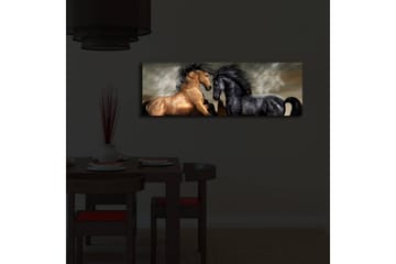 Lerretsbilde med LED-belysning 30x90 cm - To hester som møtes i en kraftfull og dramatisk komposisjon - Gull / Svart / Grå - Interiør - Maleri & posters - Lerretsbilder