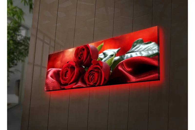 Lerretsbilde med LED-belysning 30x90 cm - Tre røde roser på en myk, rød satengbakgrunn, Rød / Grønn