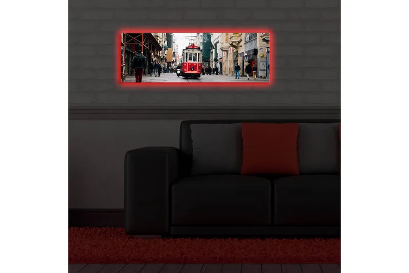 Lerretsbilde med LED-belysning 30x90 cm - Trikk som beveger seg gjennom en travel bygate - Rød / Grå / Beige - Interiør - Maleri & posters - Lerretsbilder