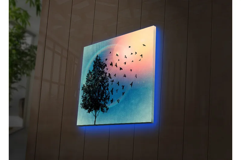 Lerretsbilde med LED-belysning 40x40 cm - Silhuett av et tre med svevende fugler mot en fargerik bakgrunn - Blå / Rosa / Grønn - Interiør - Maleri & posters - Lerretsbilder