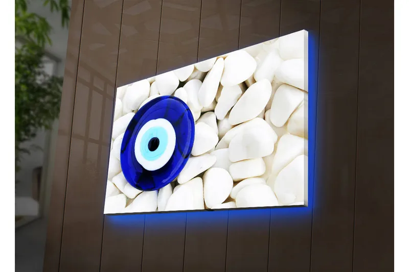 Lerretsbilde med LED-belysning 45x70 cm - Blått øye mot en bakgrunn av hvite steiner - Blå / Hvit - Interiør - Maleri & posters - Lerretsbilder