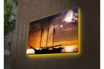 Lerretsbilde med LED-belysning 45x70 cm - Seilbåt mot en solnedgang over havet - Oransje / Svart / Gull - Interiør - Maleri & posters - Lerretsbilder