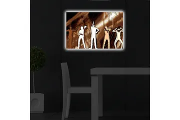 Lerretsbilde med LED-belysning 45x70 cm - Silhuetter av mennesker i forskjellige positurer mot en brun bakgrunn - Brun / Hvit / Beige - Interiør - Maleri & posters - Lerretsbilder