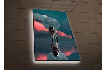 Lerretsbilde med LED-belysning - Astronaut som svever i et drømmeaktig rommiljø med en stor måne i bakgrunnen - Mørk blå / Rosa / Grå - Interiør - Maleri & posters - Lerretsbilder
