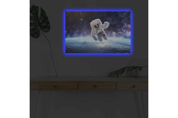 Lerretsbilde med LED-belysning - Astronaut som svever i rommet over jorden - Hvit / Blå / Svart - Interiør - Maleri & posters - Lerretsbilder