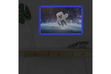 Lerretsbilde med LED-belysning - Astronaut som svever i rommet over jorden - Hvit / Blå / Svart - Interiør - Maleri & posters - Lerretsbilder